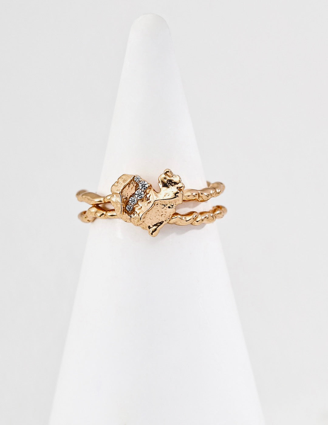 Adjustable gold ring with a heart design with crystal inlay for women.