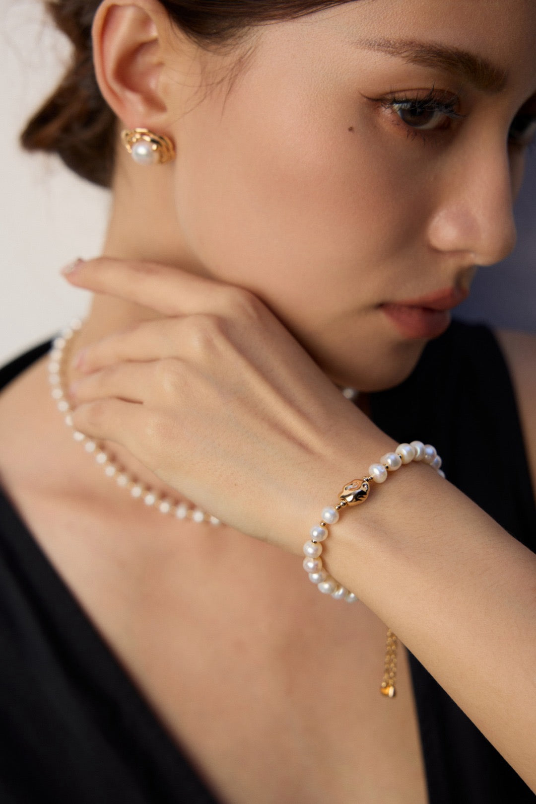 Aiko adjustable freshwater pearl bracelet in sterling silver with polished gold bead accents