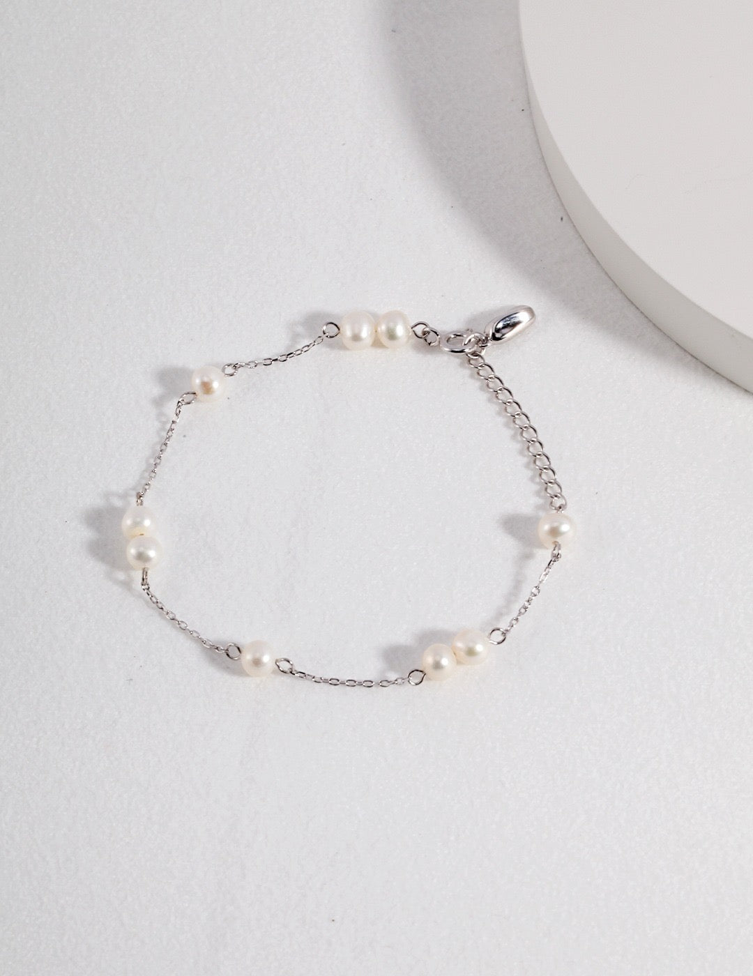Minimalist Sterling Silver Freshwater Pearl Bracelet displayed on a white background