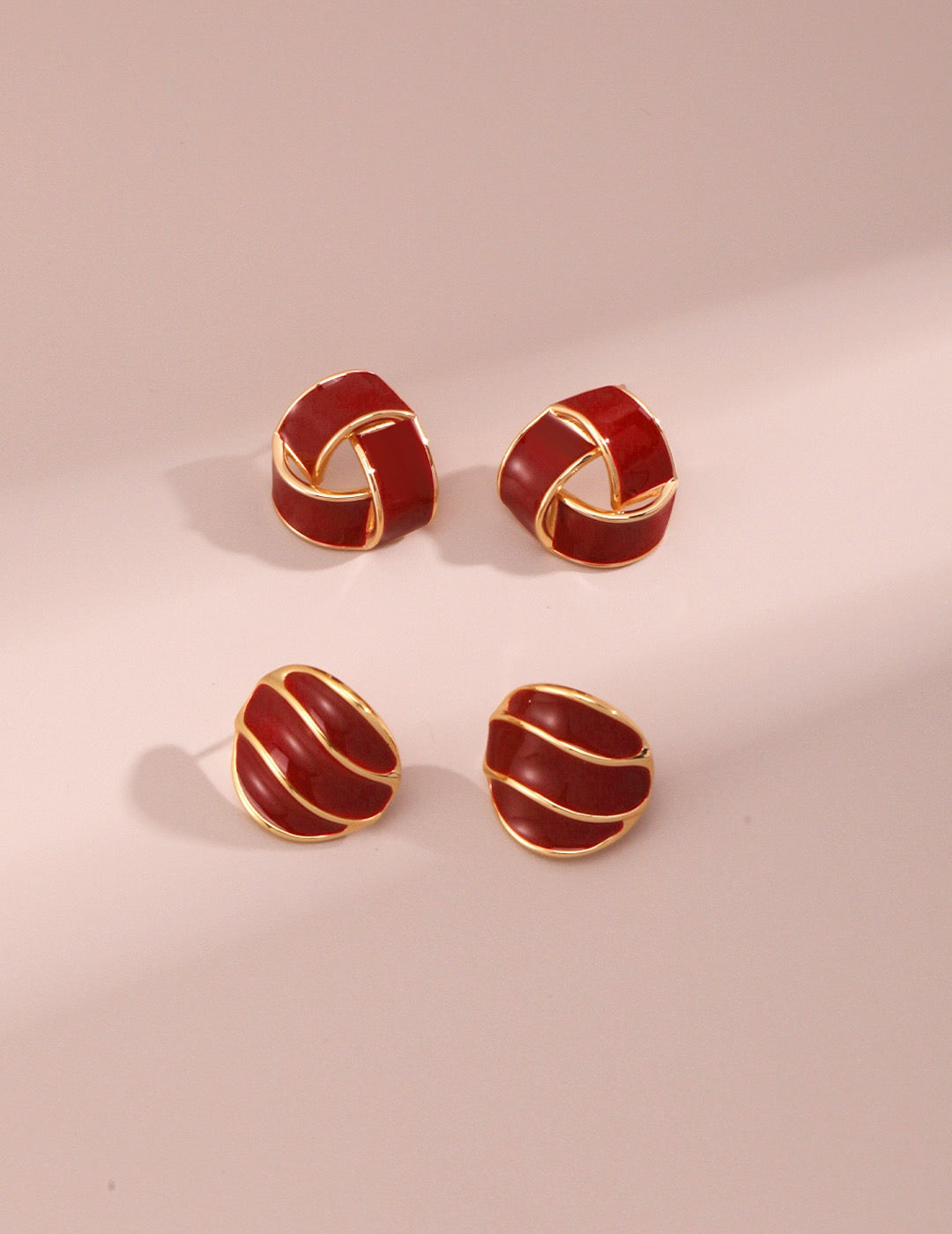 Burgundy Red Enamel Spiral Stud Earrings with Gold Trim