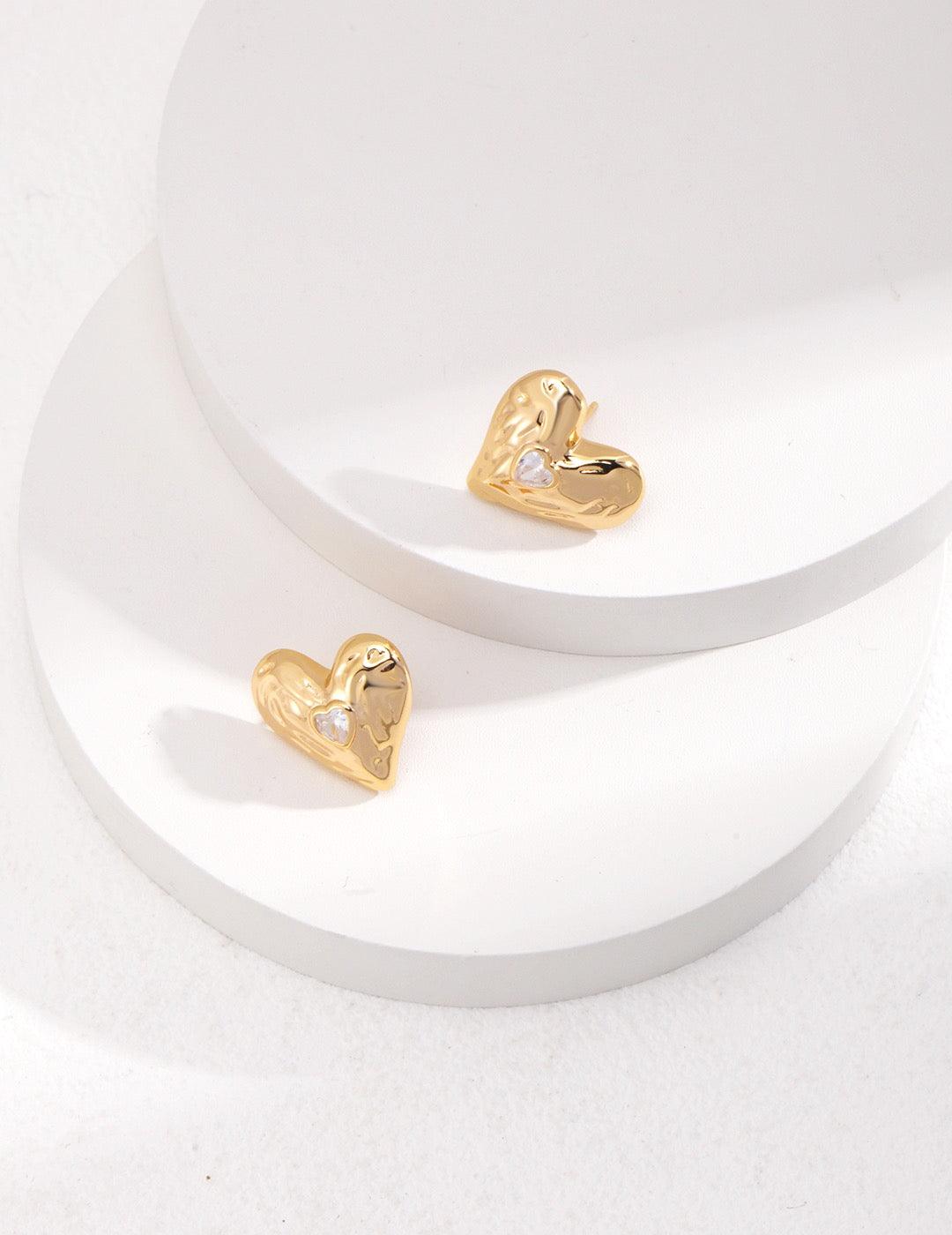 Front view of the Gold Zircon Heart Shape Stud Earrings displayed on the white background.