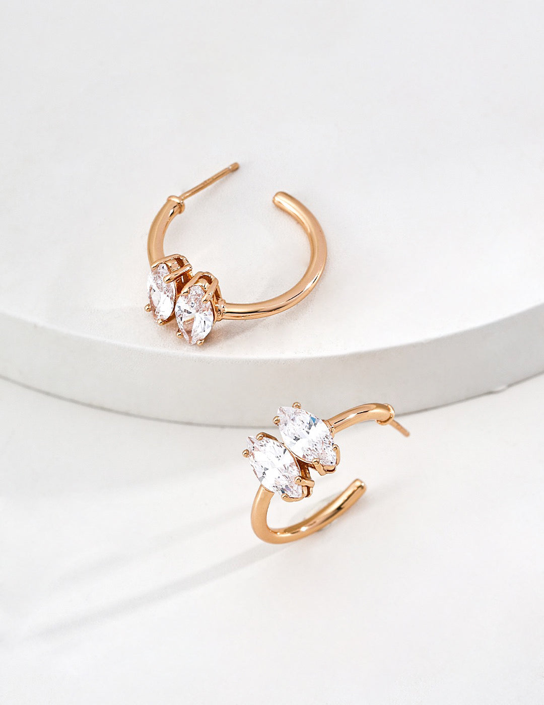 Gold huggie crystal earrings