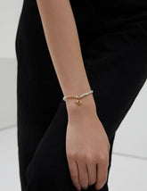 A women is wearing a Northstar Jadeite Bracelet