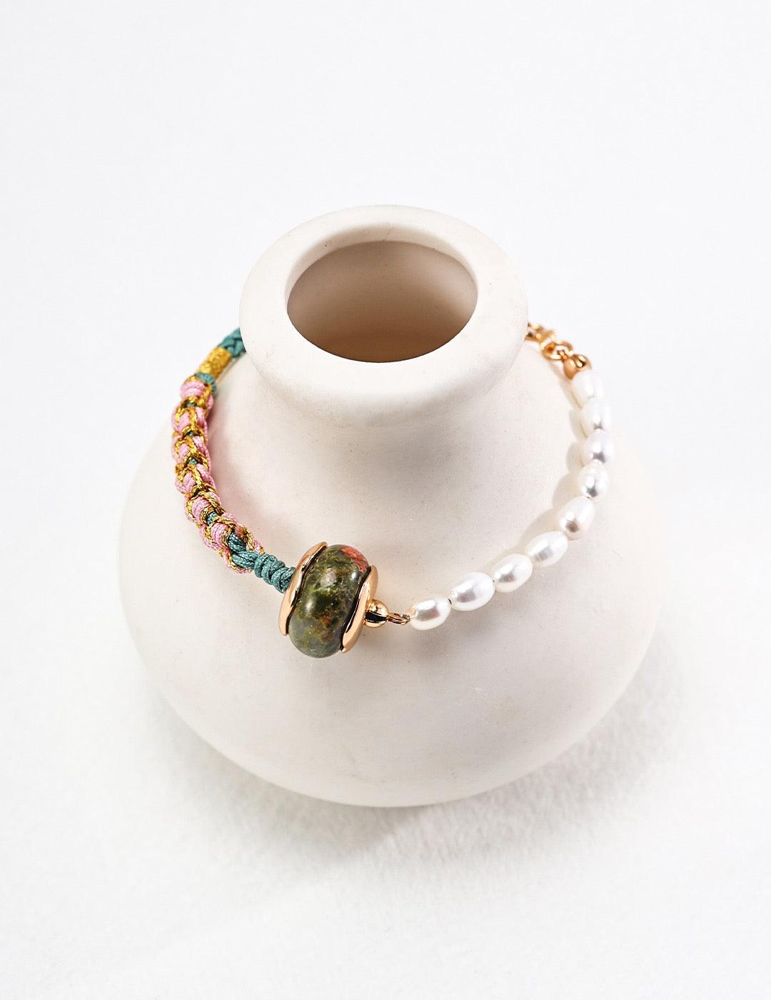 RuYi Bracelet displayed on the white vessel.