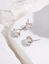 Pearl Claw Asymmetrical Earring