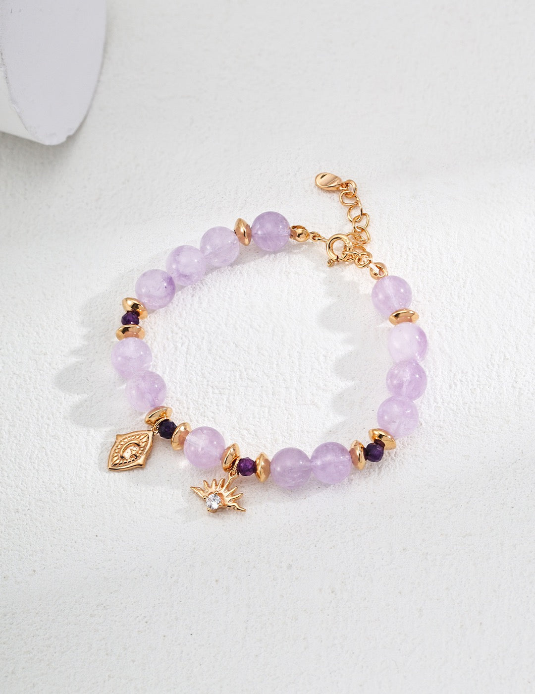 Celestial Amethyst Zircon Bracelet in 18K Gold, front view showcasing its minimalist design with a row of Amethysts and Zircon Pendants.