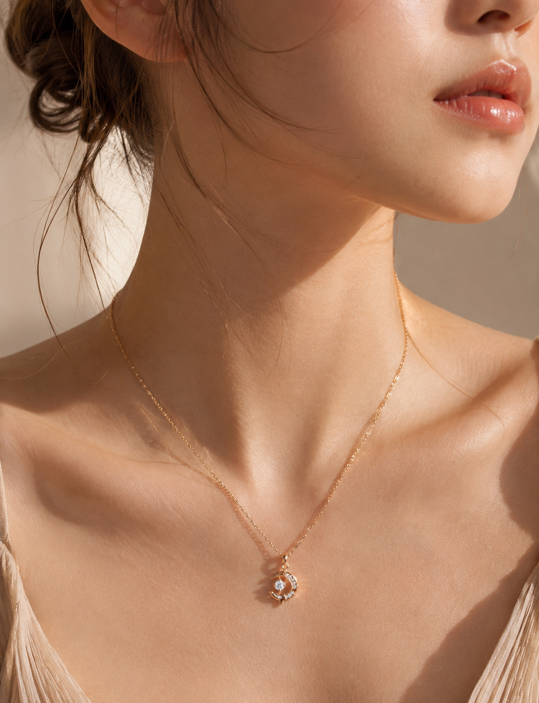 18K gold vermeil Celestine crescent moon and star necklace worn on a model