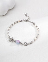 Chrysoberyl pearl flower charm bracelet in 18K gold vermeil with star detail charms