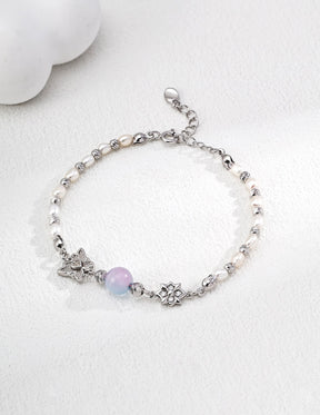Chrysoberyl pearl flower charm bracelet in 18K gold vermeil with star detail charms