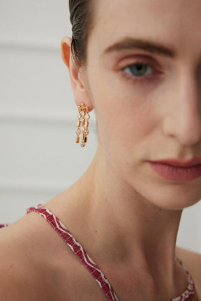 Clara Tassel Earrings wear by a women.