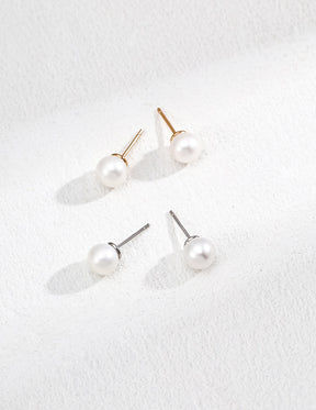 Pearl earrings on a white background