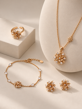 Elowen Radiant Bloom Pendant Necklace displayed with matching earrings, bracelet, and ring, sold separately.