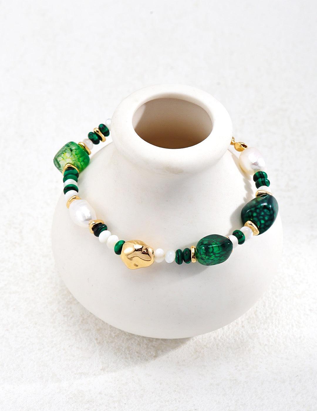 Malachite & Green Blue Lace Agate are prized for their protective and calming properties.  Absorbs negative energy