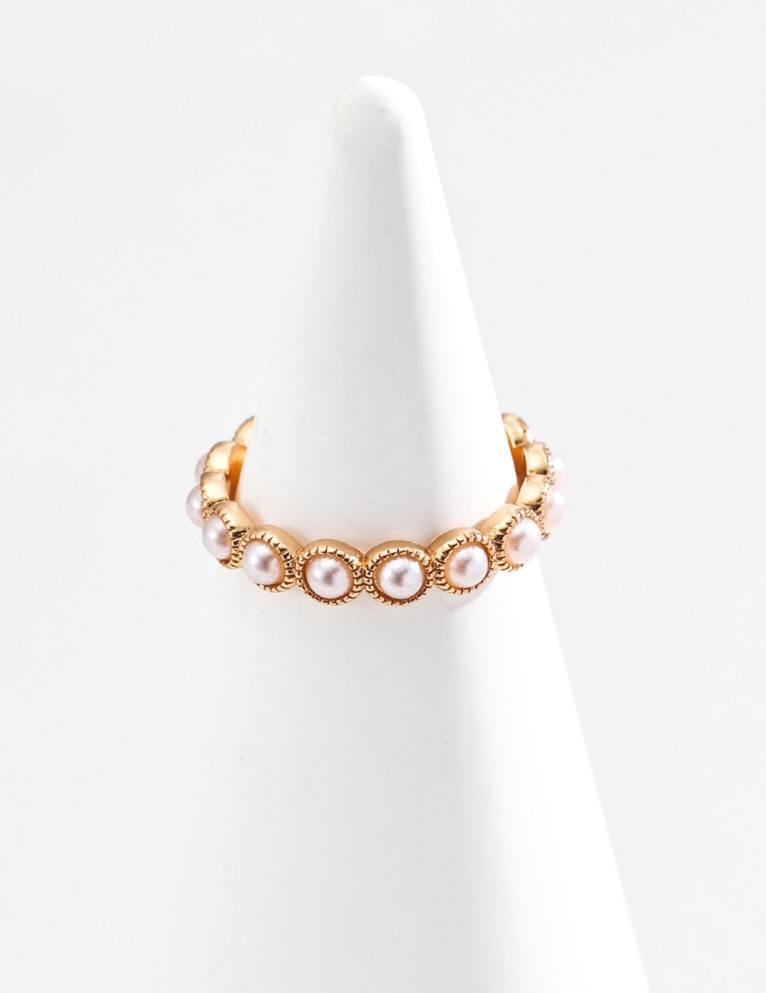 Front view of Seraphina Adjustable Pearl Cuff Ring in 18K Gold, focusing on its elegant pearl alignment and open cuff design.