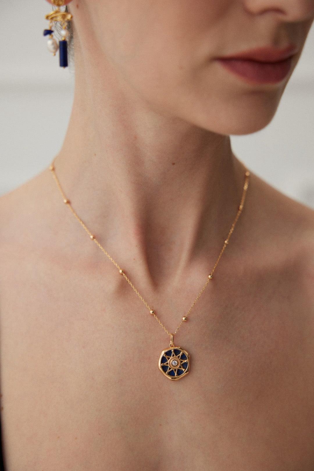 Lapis Lazuli Stellar Pendant Necklace wore by a women.