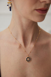 Lapis Lazuli Stellar Pendant Necklace wore by a women.