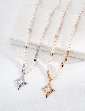 Three pearl necklaces with star-shaped pendants in silver, gold, and rose gold on a white background.