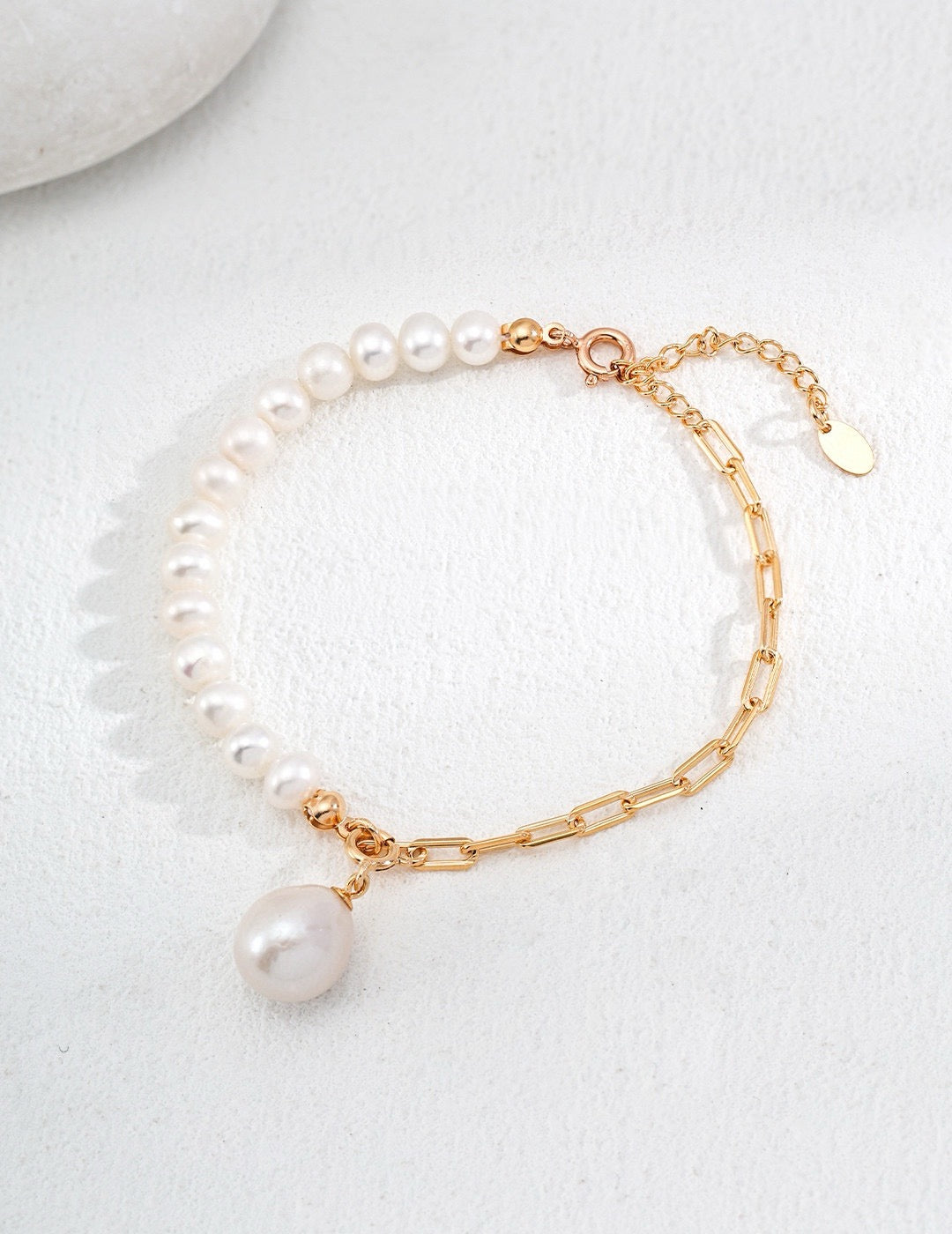 Luna Dual-Chain Freshwater Pearl Bracelet In 18K Gold displayed on the white background.