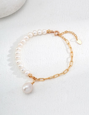 Luna Dual-Chain Freshwater Pearl Bracelet In 18K Gold displayed on the white background.