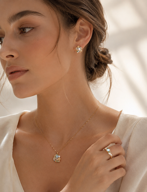 Marquise crystal set worn on model — 18K gold vermeil ring, drop earrings and zircon pendant necklace styled together
