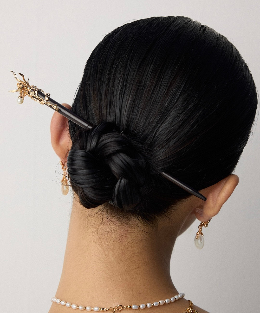 Neo-Chinese Pearl Hair Stick styled in updo, purple sandalwood and gold dragon hairpin | Lia Atelier