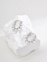 Sterling Silver pearl hoop earrings for women.