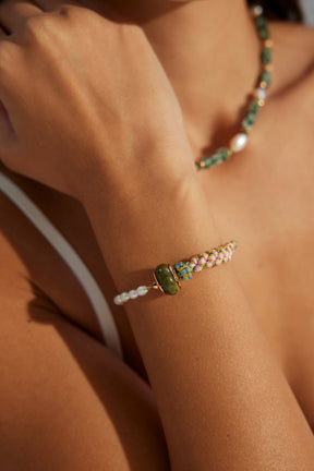 A close-up of the RuYi Bracelet - Neo-Chinese Style Bracelet wear by the model.