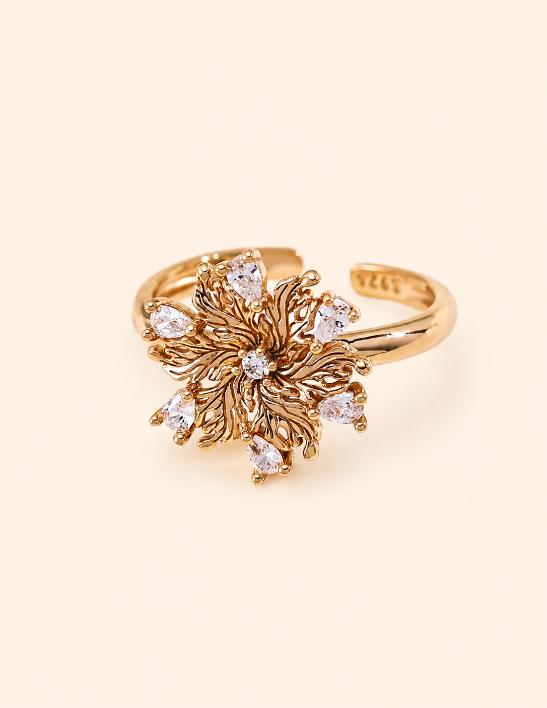 Elowen Radiant Bloom zircon flower open ring on an ivory background