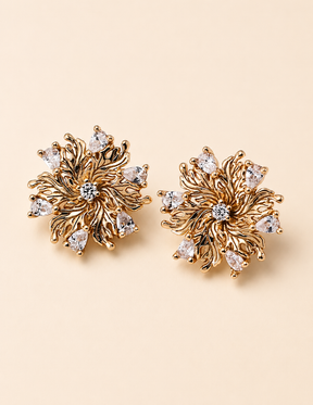 Close-up of Elowen Radiant Bloom earrings in 18K gold vermeil and zircon